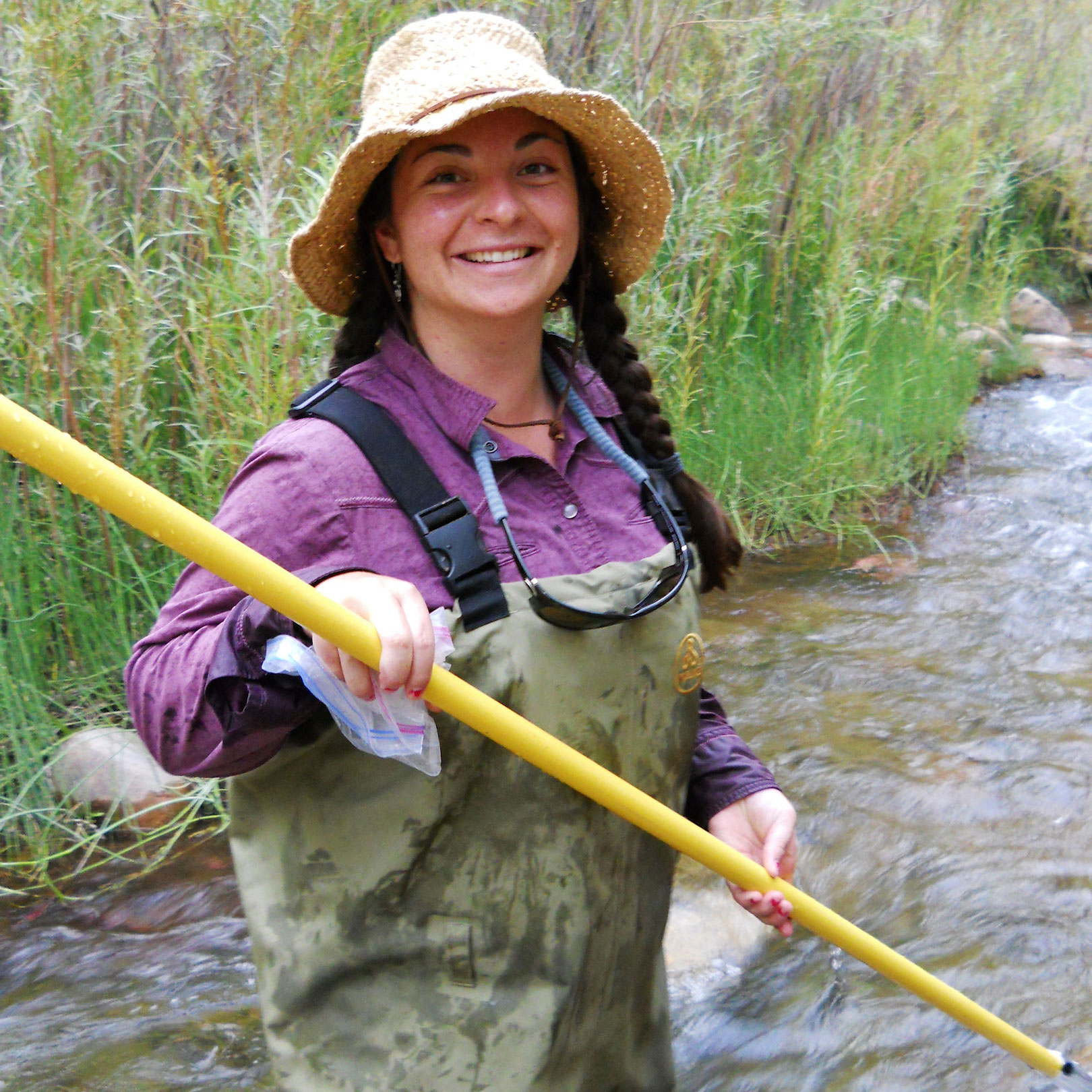 female Avery scholar in field